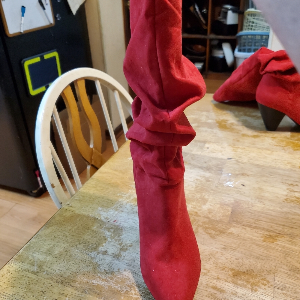 Red slouch boots.  8W